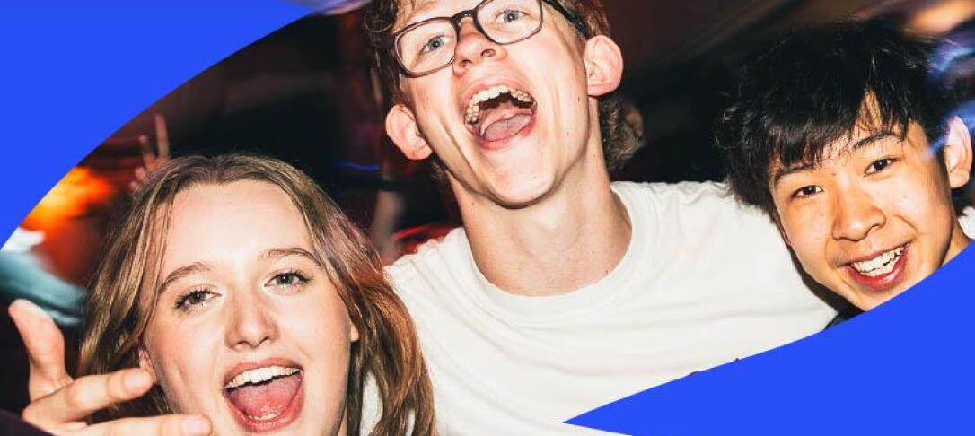 students smiling at a party
