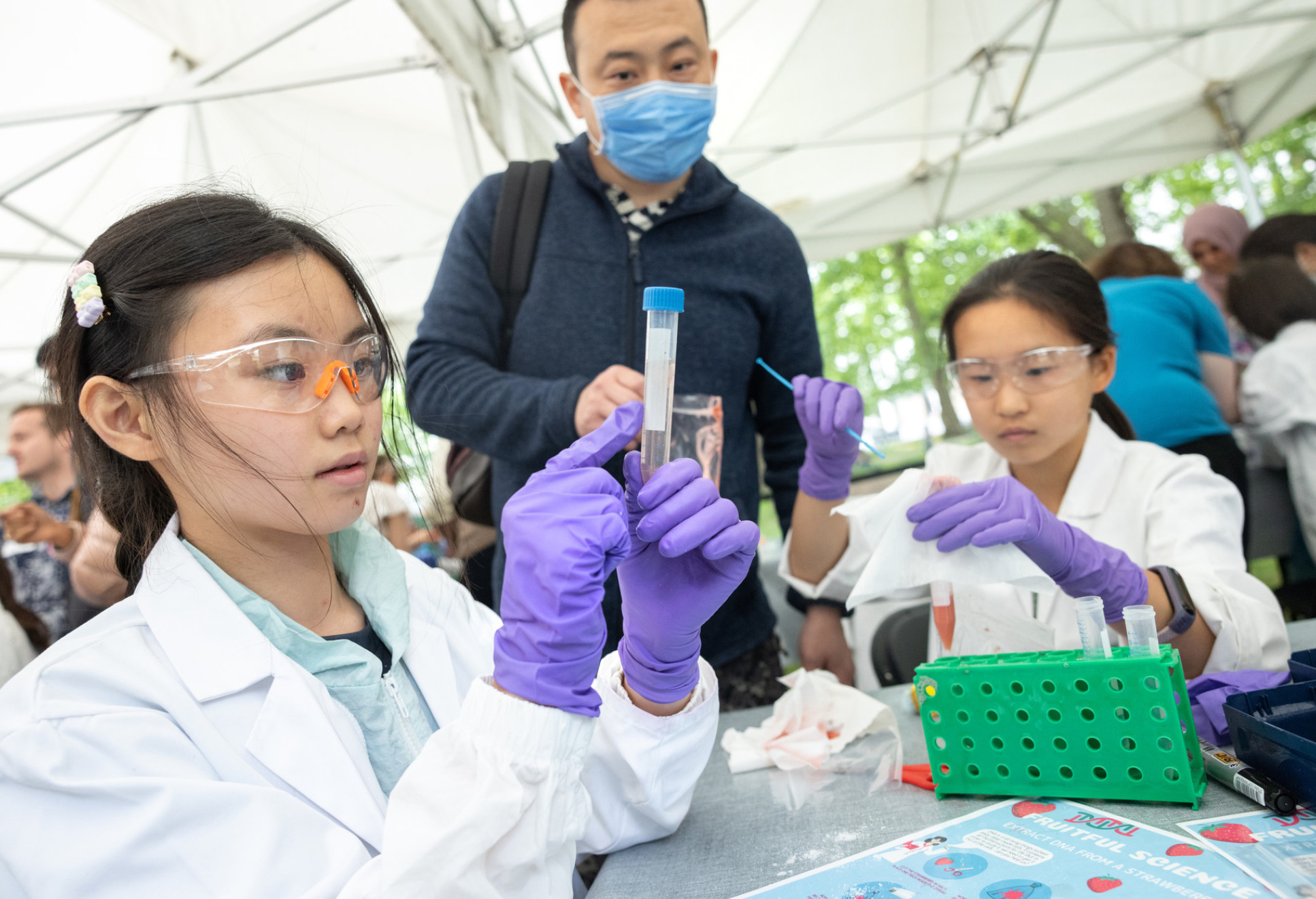 Two children use pipettes