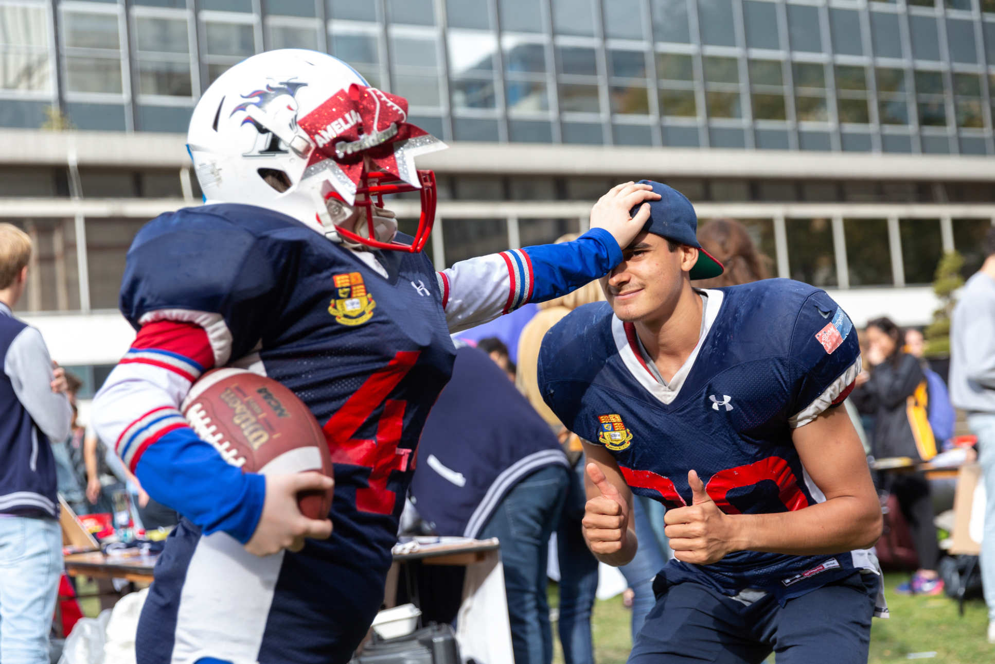 two people in american football kit