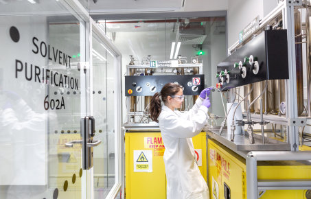 Research student dispensing dry solvents from the solvent towers in the Molecular Science Research Hub (MSRH)