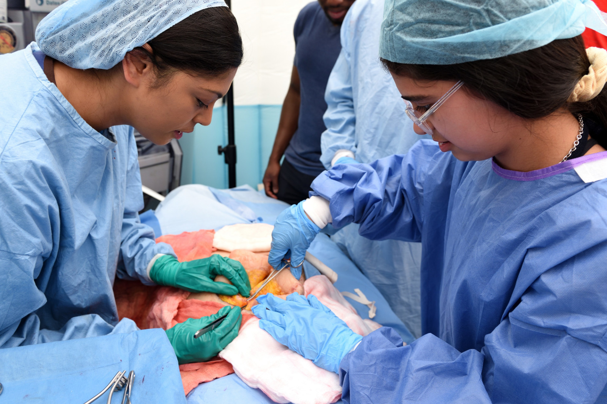 Participants in a mock surgical theatre