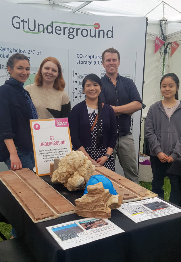 ESE Researchers and students show rocks used to store carbon.