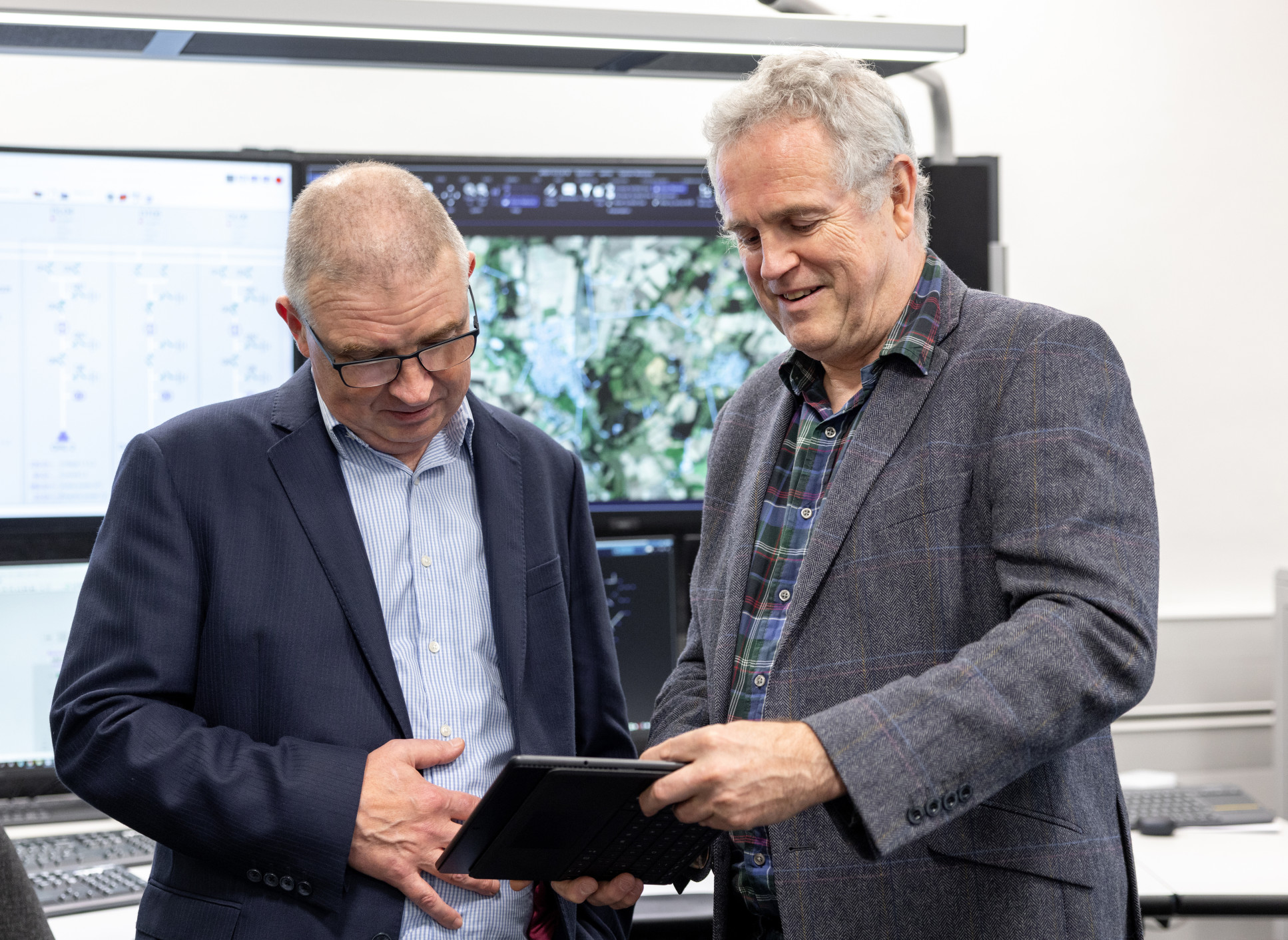 Mark is pictured here in the Digital Energy Demonstrator with Darren Jones, technology manager from Hitachi.