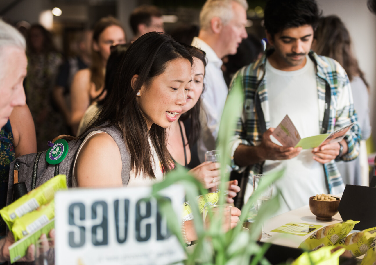Partygoers enjoying a range of snacks provided by alumni startup Saved Food