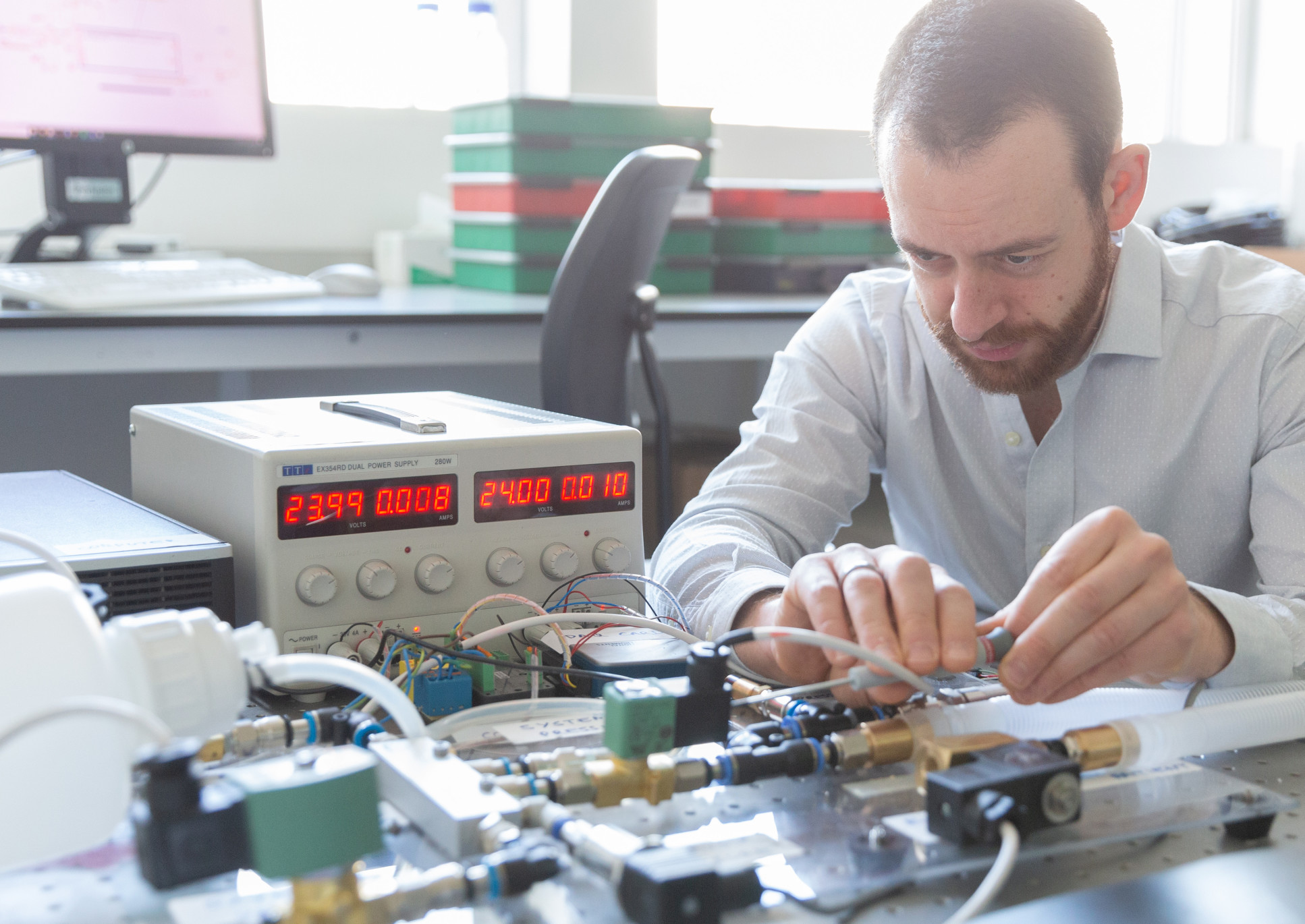 The Jamvent team working on electronics