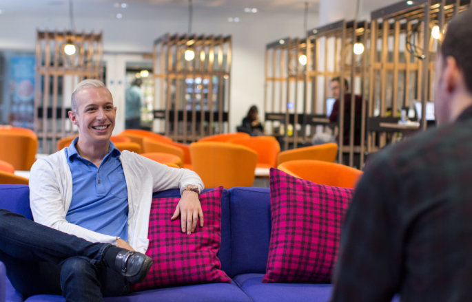 Students chatting in a study bedroom in Eastside