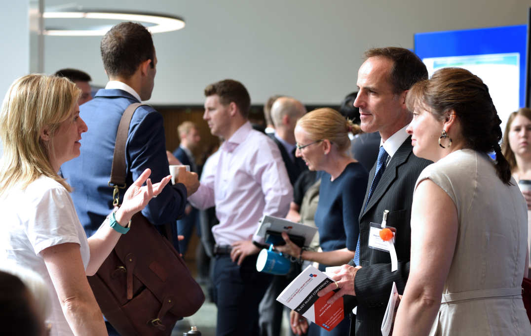 Photos of delegates mingling