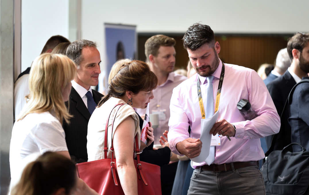 Photos of delegates mingling