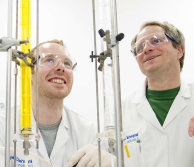 Two researchers carrying out research in the lab