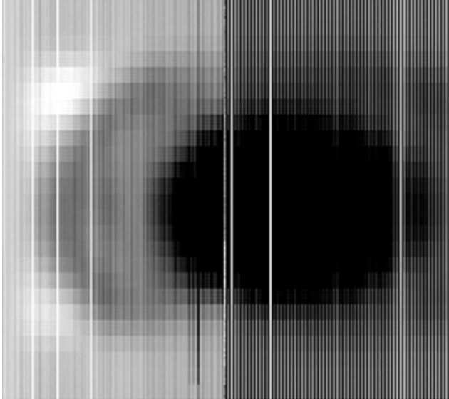 Image of the Cold Blackbody (CBB) showing the rectangular aperture in the -28 degC shroud, patches of the warmer chamber wall (approx 18 degC) showing in the corners of the aperture, and the CBB at 77K as the dark spot in the centre of the aperture.