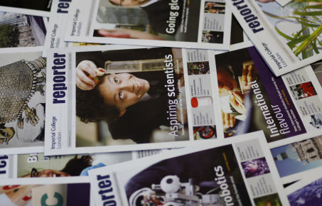 Image of back issues of the Reporter magazine