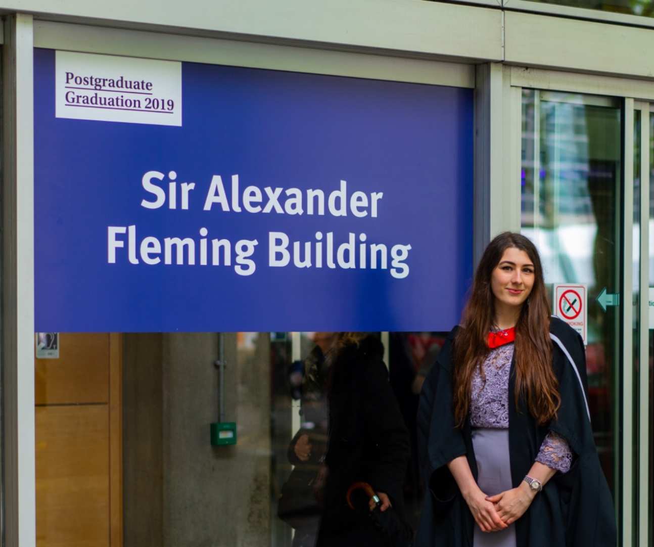Kate Gallagher outside Sir Alexander Fleming Building