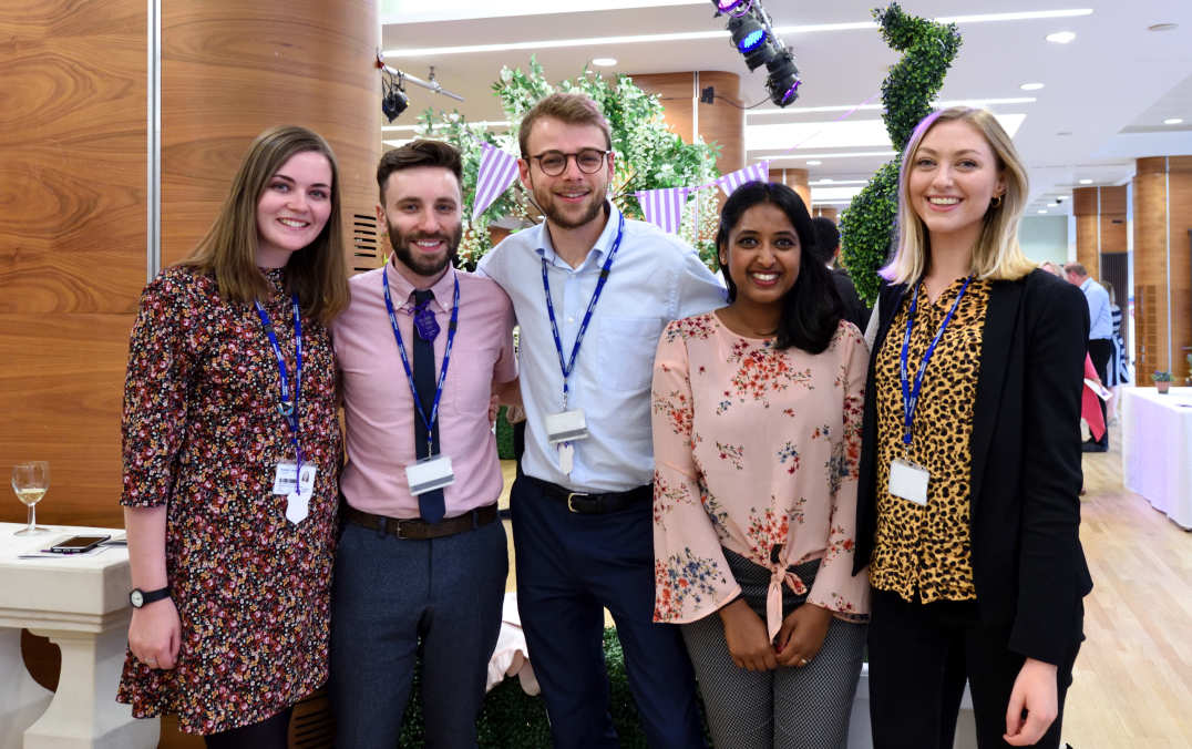 staff posing for group photo