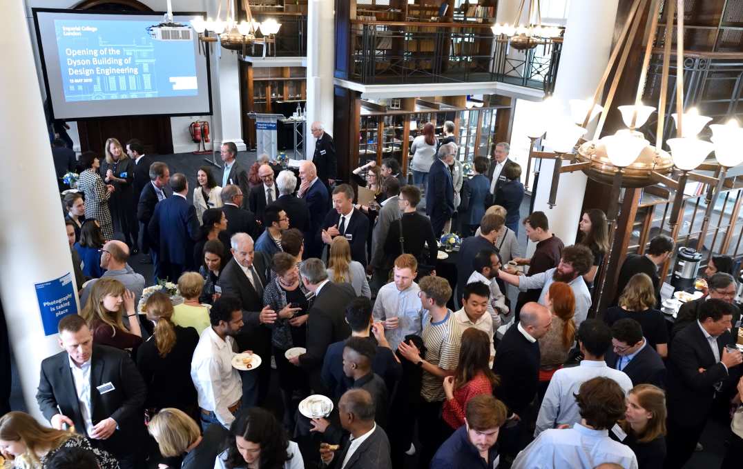 Photo of people mingling in the library