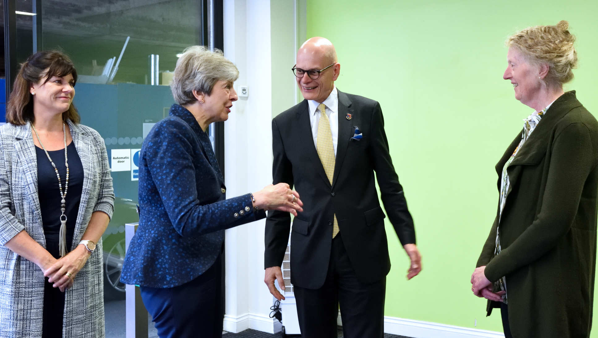 Claire Perry and Theresa May discussed the zero emissions pledge with Provost Ian Walmsley and Professor Joanna Haigh