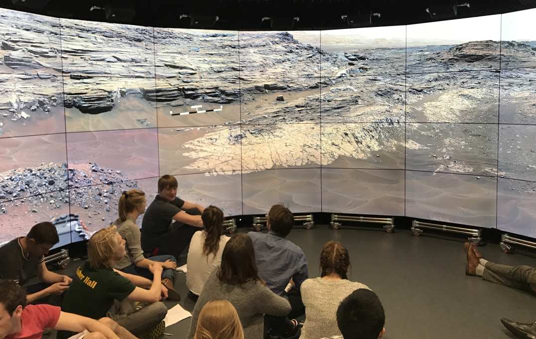 Undergraduates looking at images of Mars in Data Science Institute