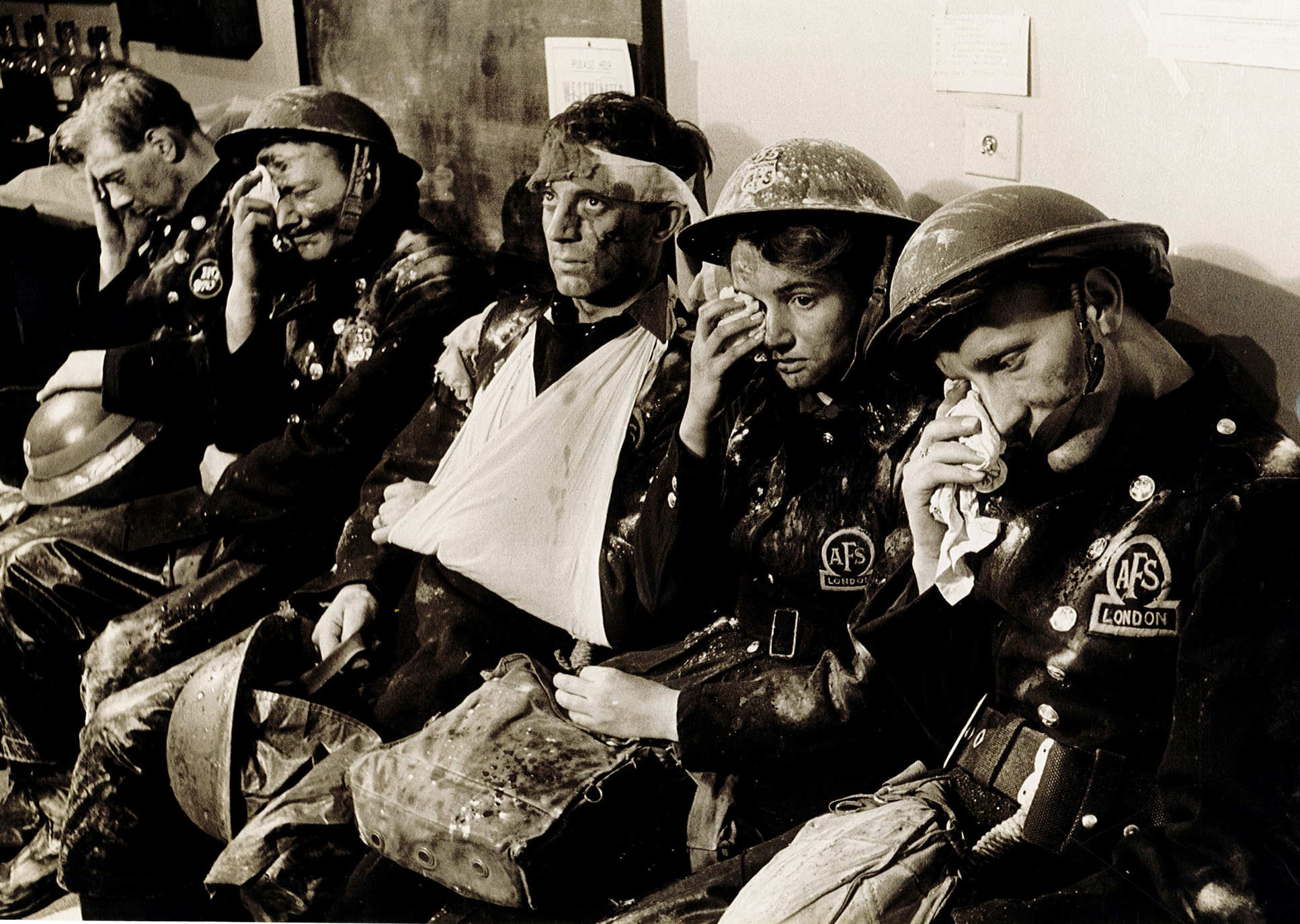 A group of firefighters, waiting for treatment at Westminster Hospital after sustaining injuries during the Blitz, May 1942. (Image: Chelsea and Westminster Hospital)