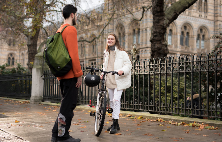 A student outside the Natural History Museum