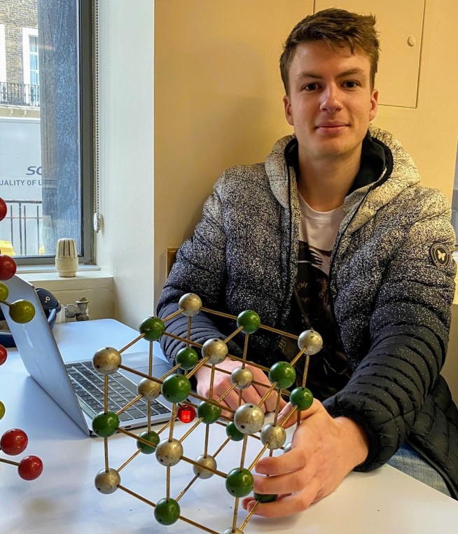 Mr Seán Kavanagh, co-first author and Research Postgraduate with an atomic model of the AgBiS2 rocksalt crystal structure.