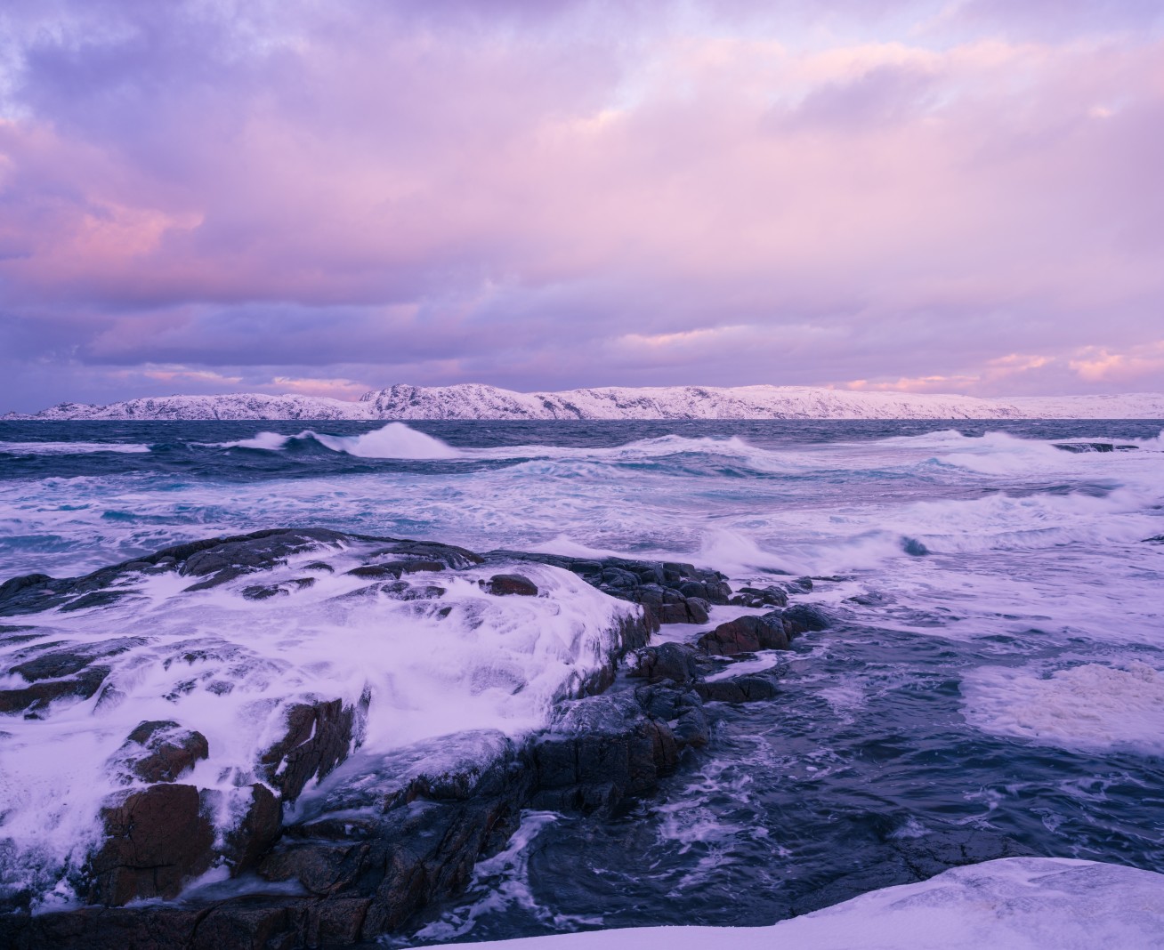 An image of clouds over the Arctic Ocean.