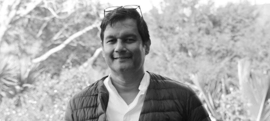 Black and white photo of Professor Ashvin Thambya