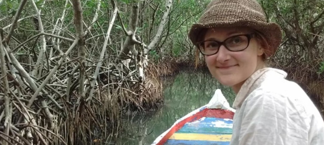 Dr Johanna Eklund on a canoe in the rainforest