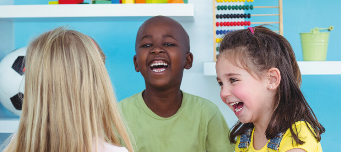 Child's hands playing with plastic bricks