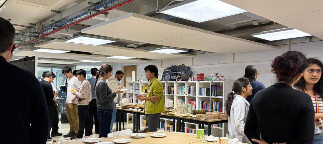 Photo showing students at a cafe event