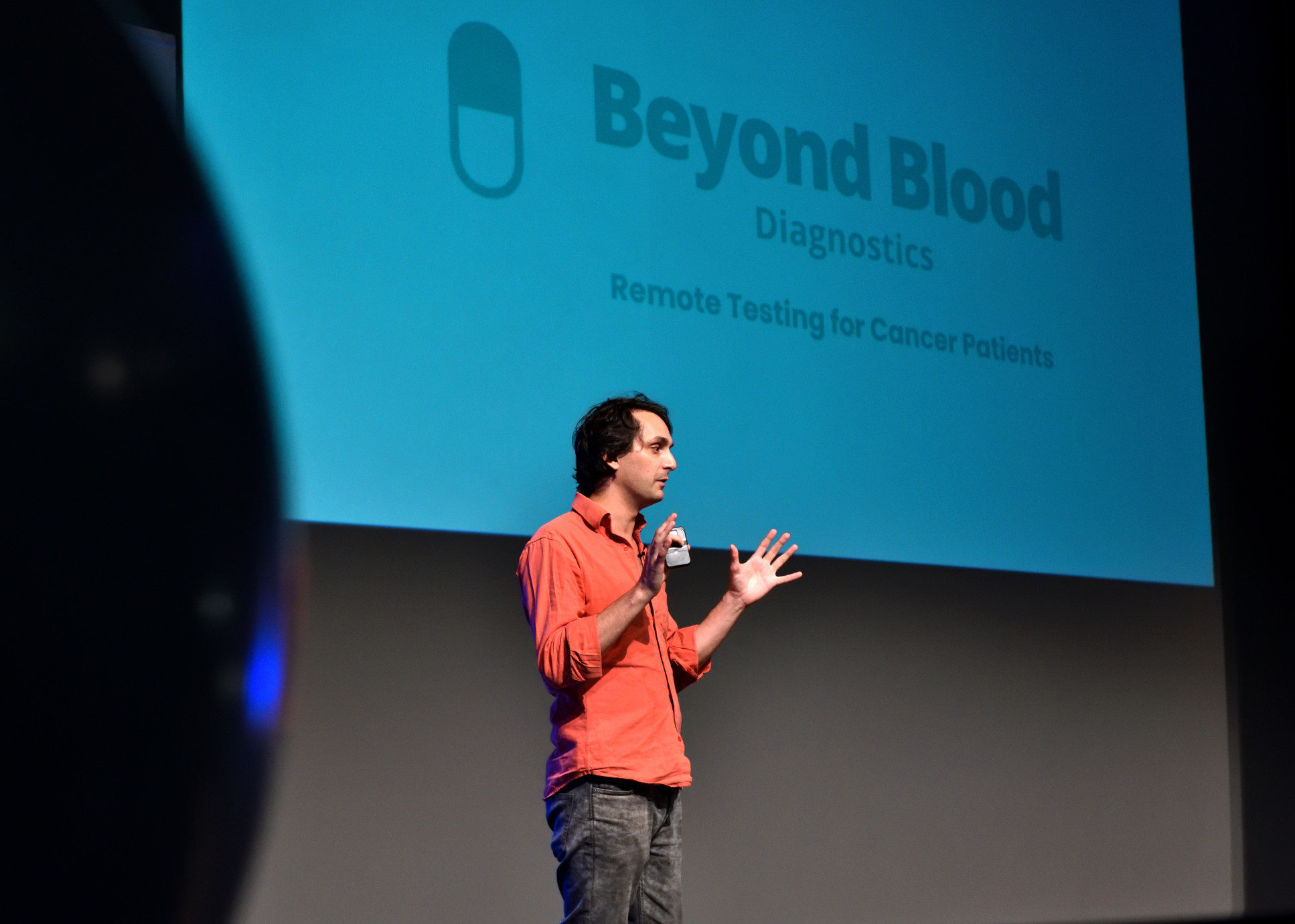 Manfredi San Germano, founder of Beyond Blood, presents in front of a screen