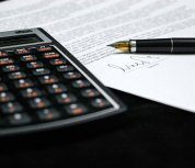 Calculator, pen and paper