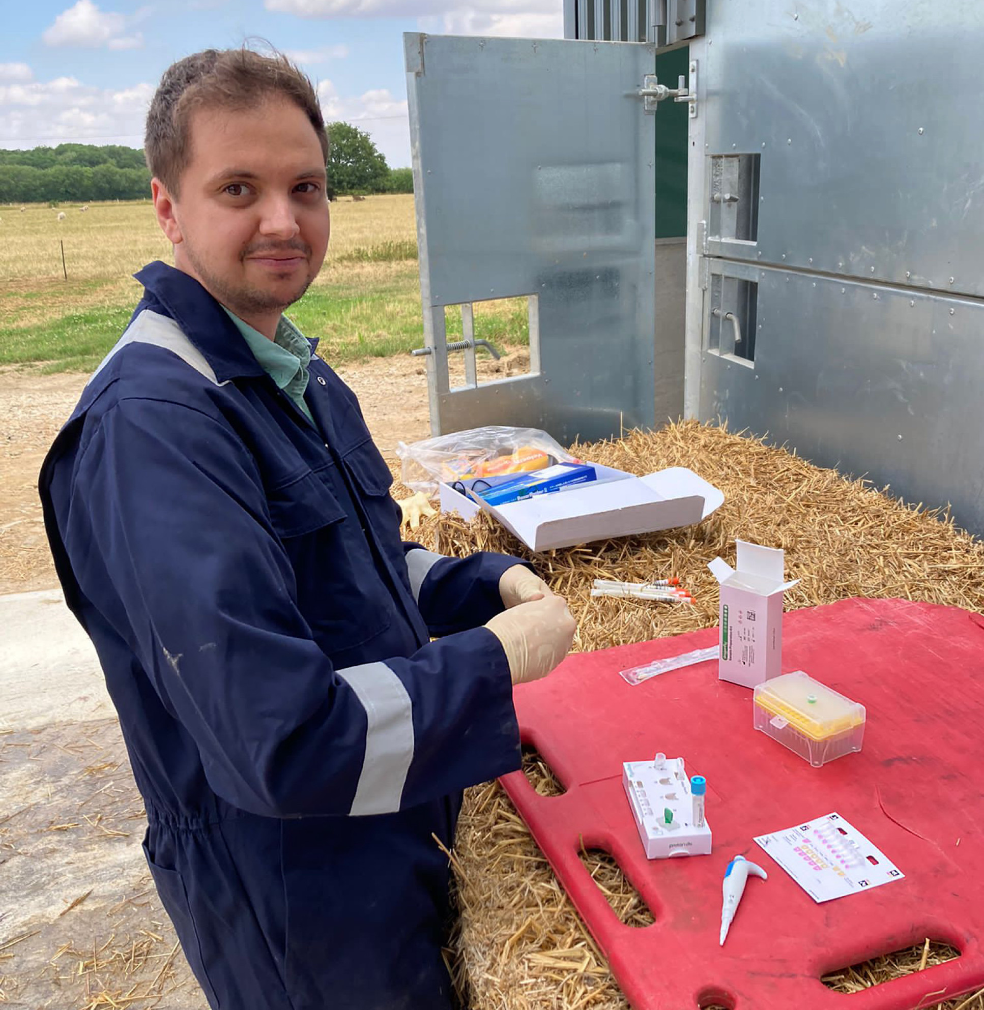 researcher carrying out test on farm