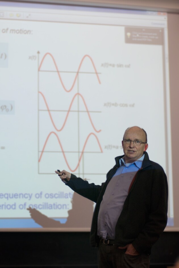 Professor Norbert Klein teaching in a class
