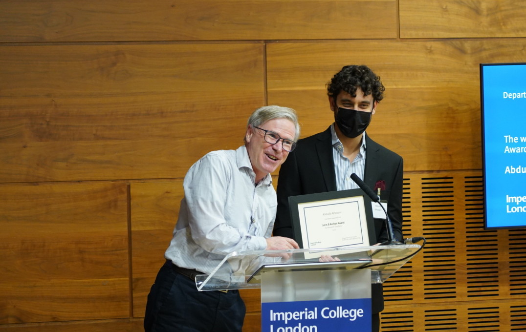 Abdulla Alhosani receives certificate from Martin Blunt