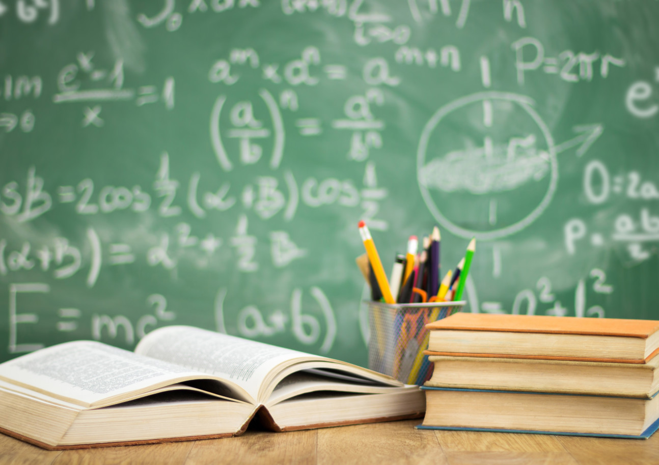 Books and a blackboard in a classroom