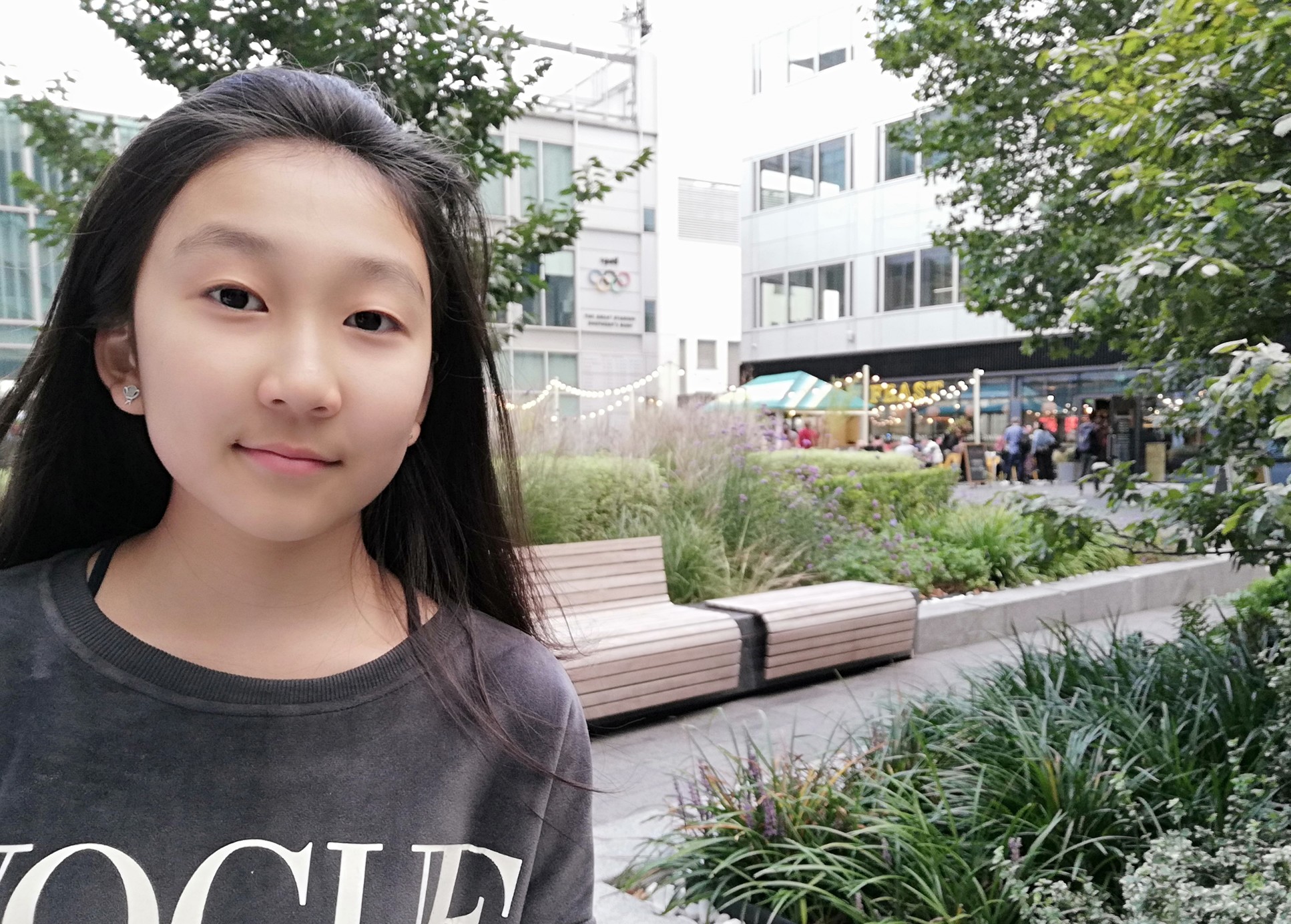 young girl smiles at camera