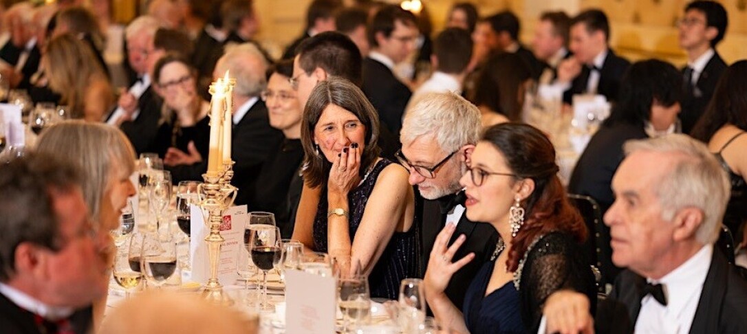A photo of guests interacting at a previous CGCA  annual dinner