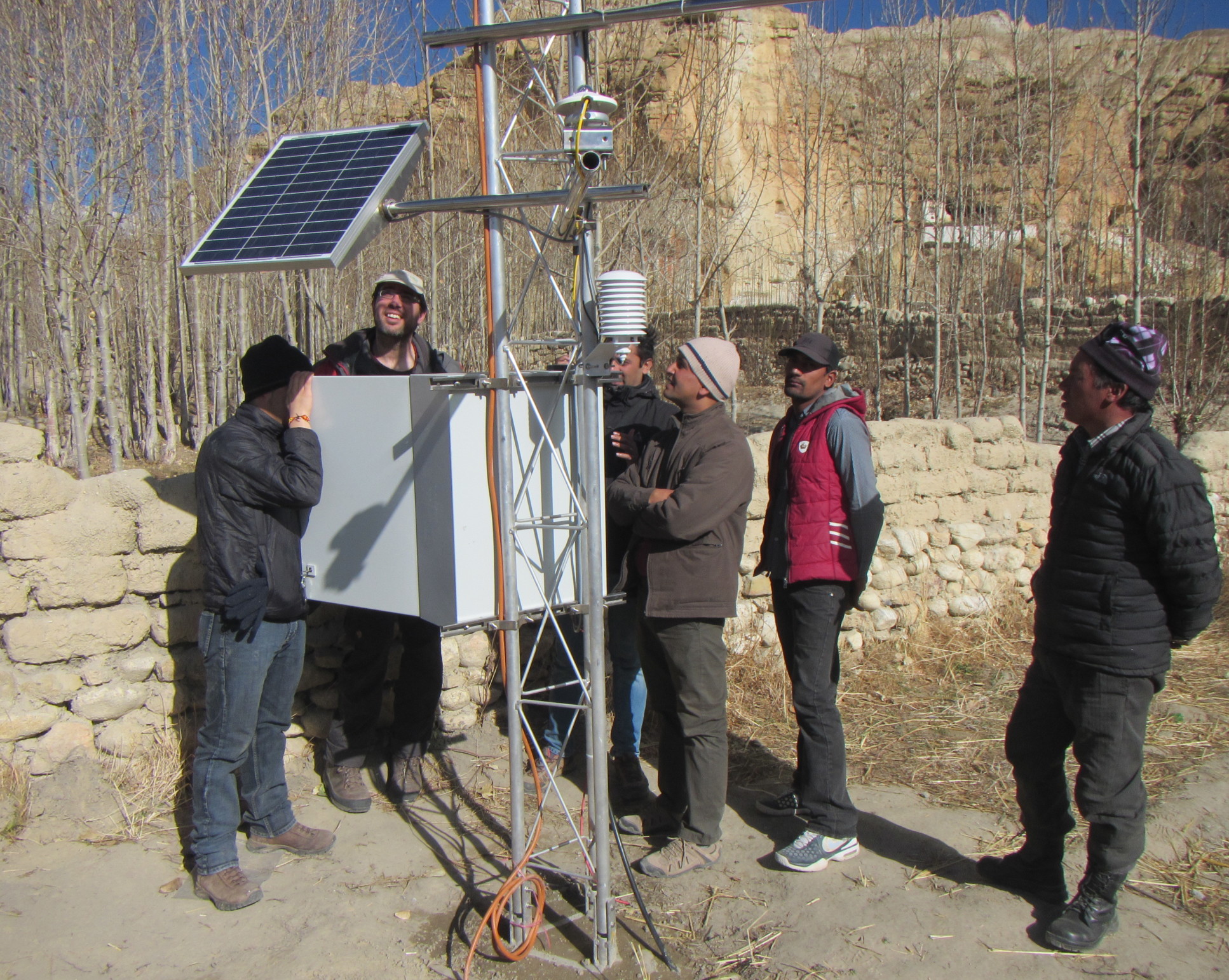 Professor Wouter Buytaert and local collaborators on fieldwork inspecting a project weather station in the upper Kaligandaki river basin, Nepal