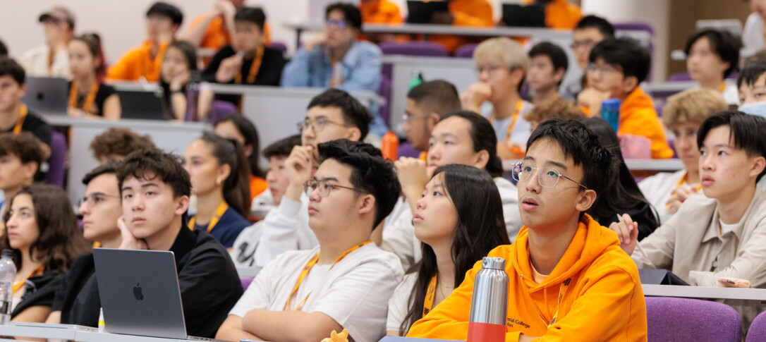 Global Summer School students in a lecture theatre listening