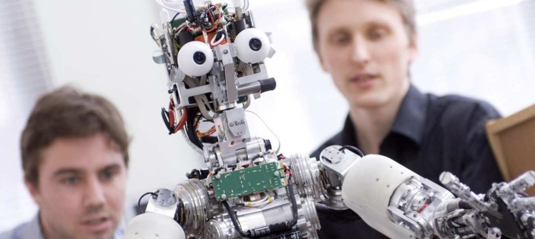 Students working on a robot prototype.