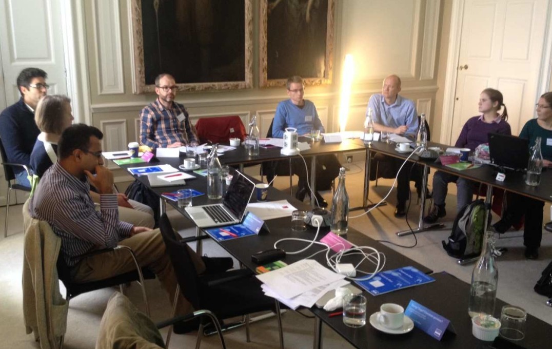 Delegates photographed at Chicheley Hall during a session at the inaugural meeting of the Red Lotus Project in 2016