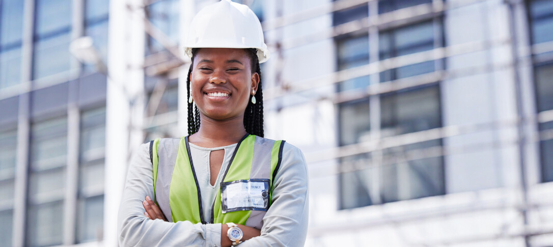 Portrait of a young black woman engineer at construction site