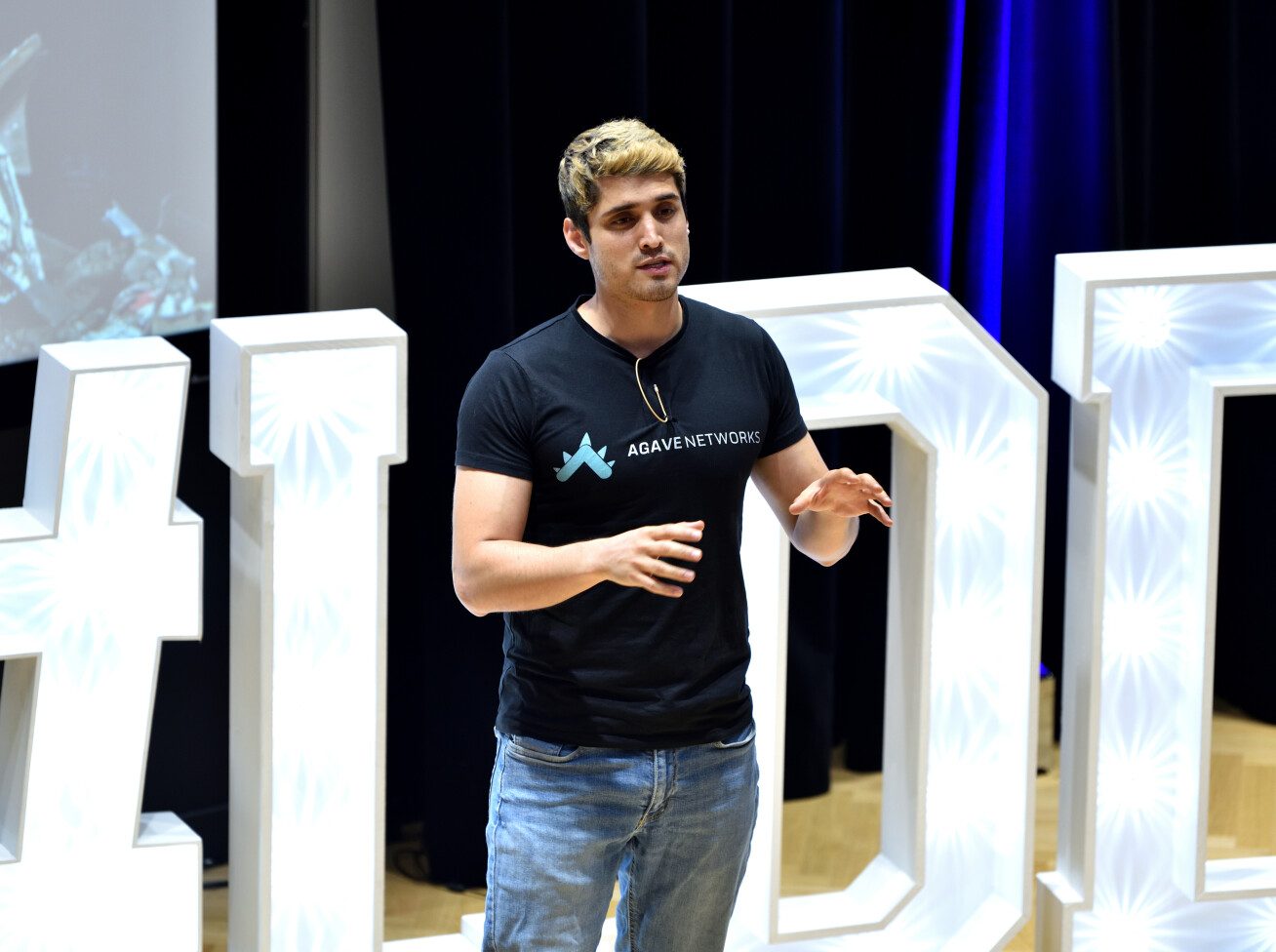 A man giving a presentation, zoomed in image