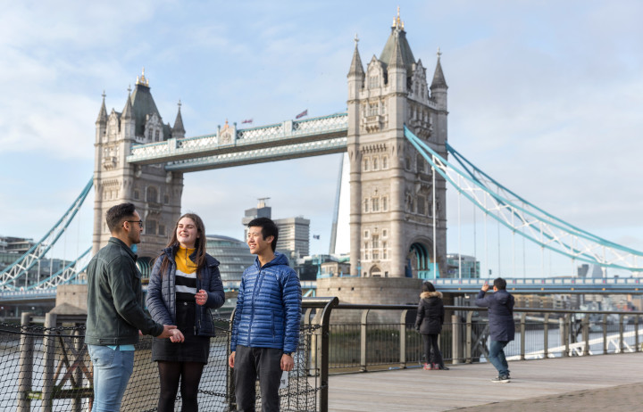 Student smiling at London Bridge