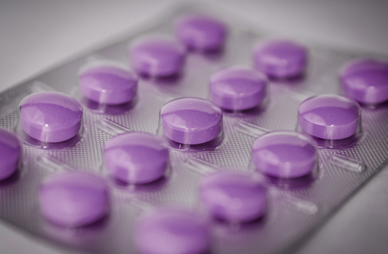 An image of purple-coloured tablets in a wrapper.