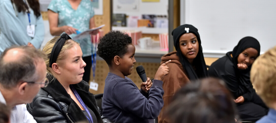 Child speaking to 