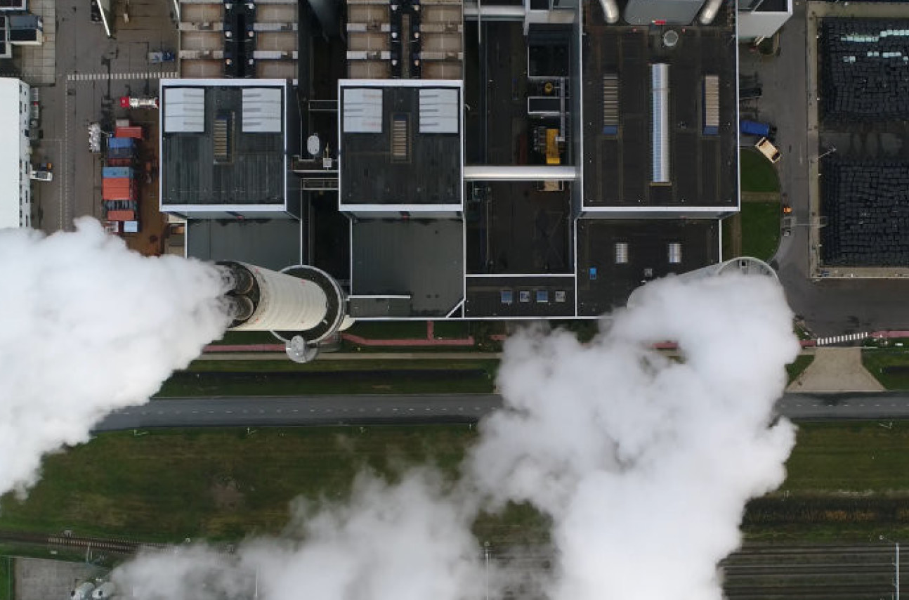 An aerial shot on fumes coming out of a processing plant
