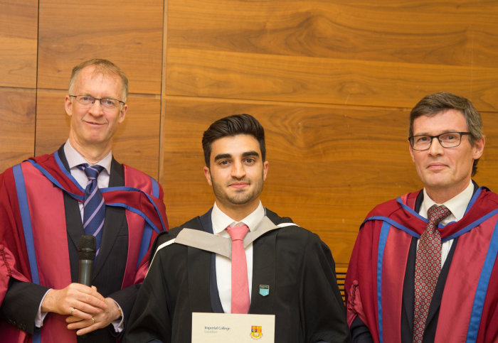 Nicholas Scerri receiving the Outstanding Achievement for Communications and Signal Processing MSc