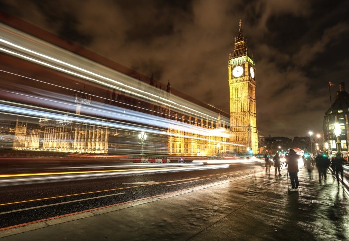 Palace of westminster at night with long exposure of traffic in the foreground