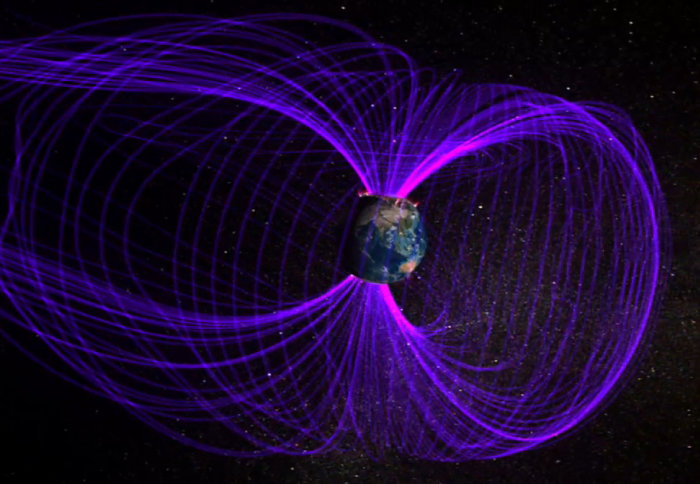 Illustration of the Earth with purple lines coming out of the north and south poles