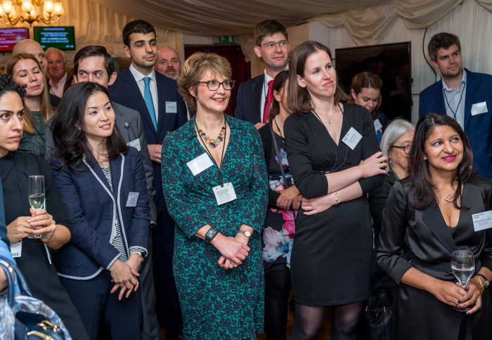 Alumni and guests listen to Lord Darzi in the House of Lords